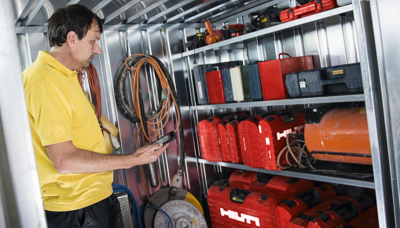 man using Hilti ON!track asset management app